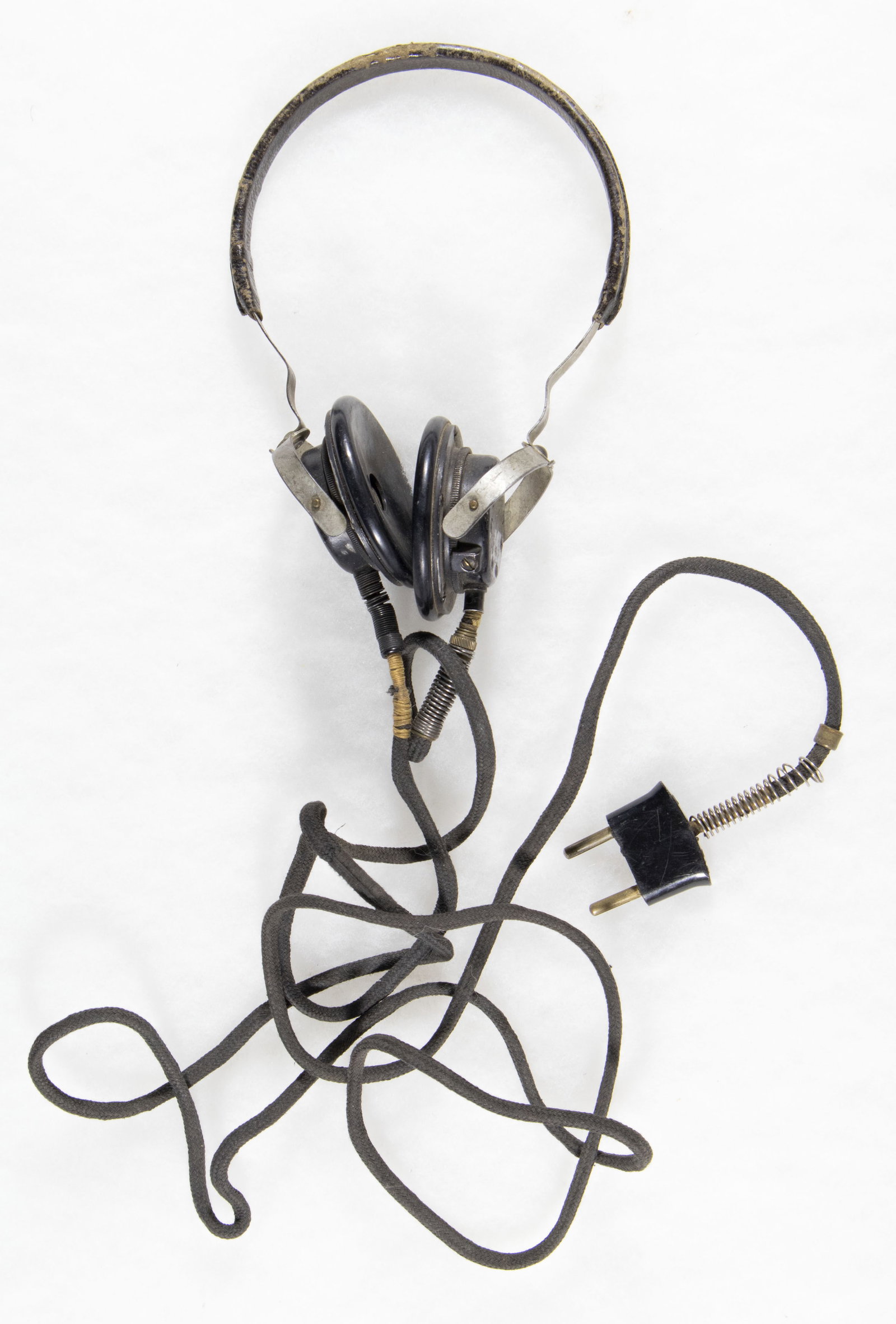 WEHRMACHT PANZER RADIO HEADSET: Rare Wehrmacht issued headset commonly used by Panzer troops, known as Doppelfernhorer. Marked ‘40’ on both ear pieces, with the Waffenamt symbol on one, a little faded obscuring the