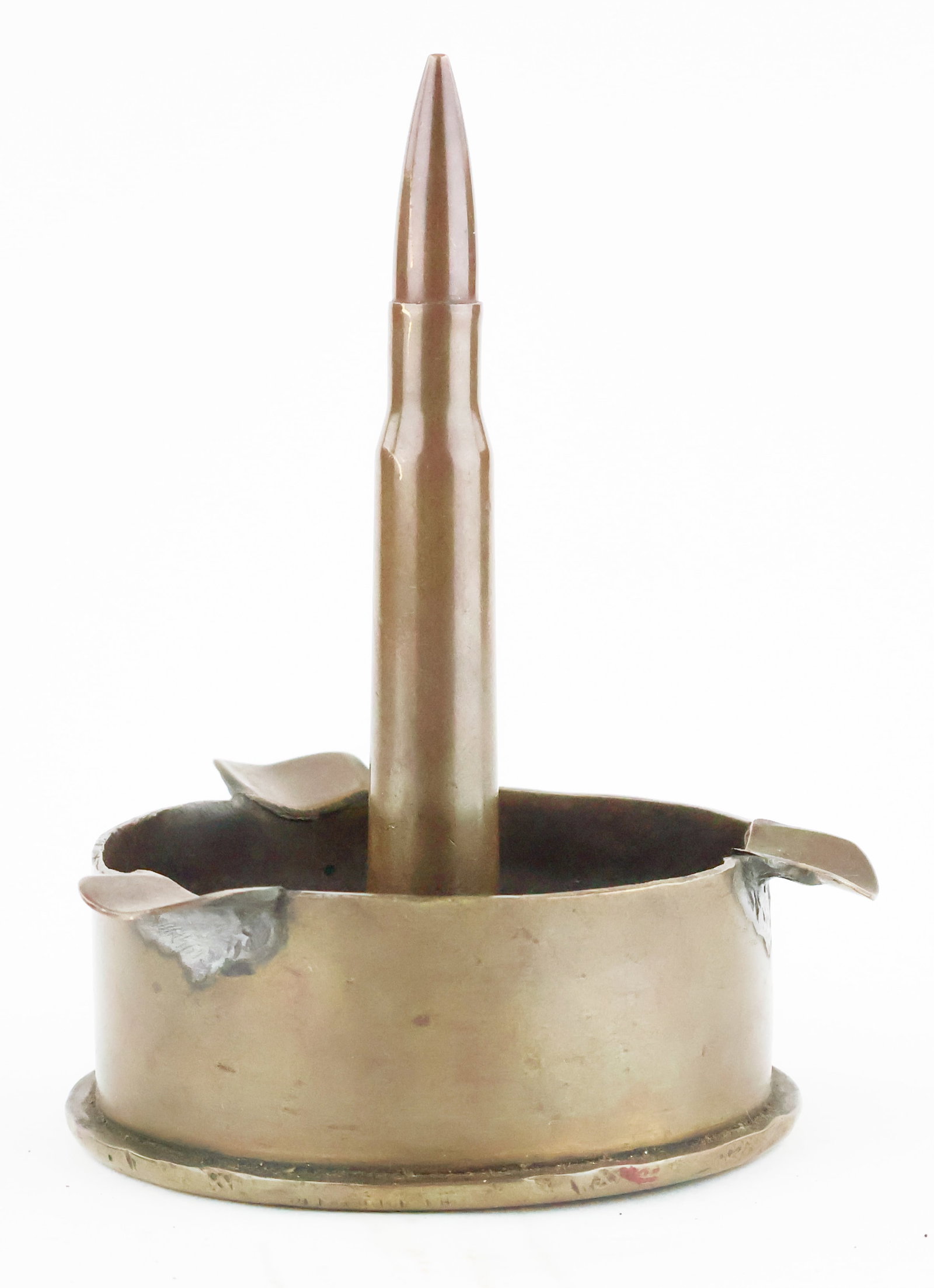 WORLD WAR II TRENCH ART ASHTRAY: A German trench art ashtray, 5 x 6.5 in., constructed from a FLAK 88mm shell with a 13mm cartridge in the center. Surrounding the shell are three supports for either a cigar or several cigarettes.