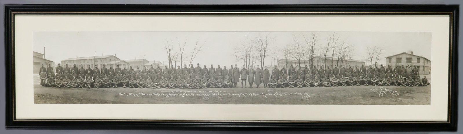 BLACK 814TH PIONEER INFANTRY 'BLACK DEVILS' COMPANY PHOTOGRAPH: Excellent original photograph showing the black troops and white officers of 'Co. L 814th Pioneer Infantry...A.E.F. from Oct. 6th to Dec. 18th, 1918' as photographed at Camp Zachary Taylor in