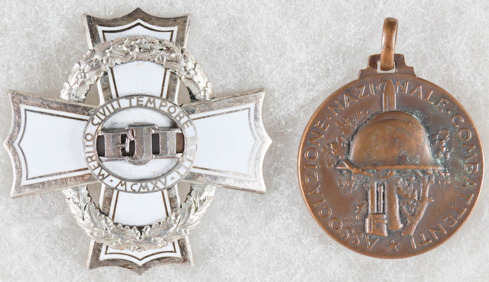 AUSTRO-HUNGARIAN WAR CROSS FOR CIVIL MERITS, ITALIAN ‘ASSOCIAZIONE NAZIONALE COMBATTENTI’: A World War I Austro-Hungarian War Cross for Civil Merits, Third Class, approx. 1.75 in square, of silver-plated tombac, depicting a qhite enameled cross rigne with an oval oak wreath, with the initia