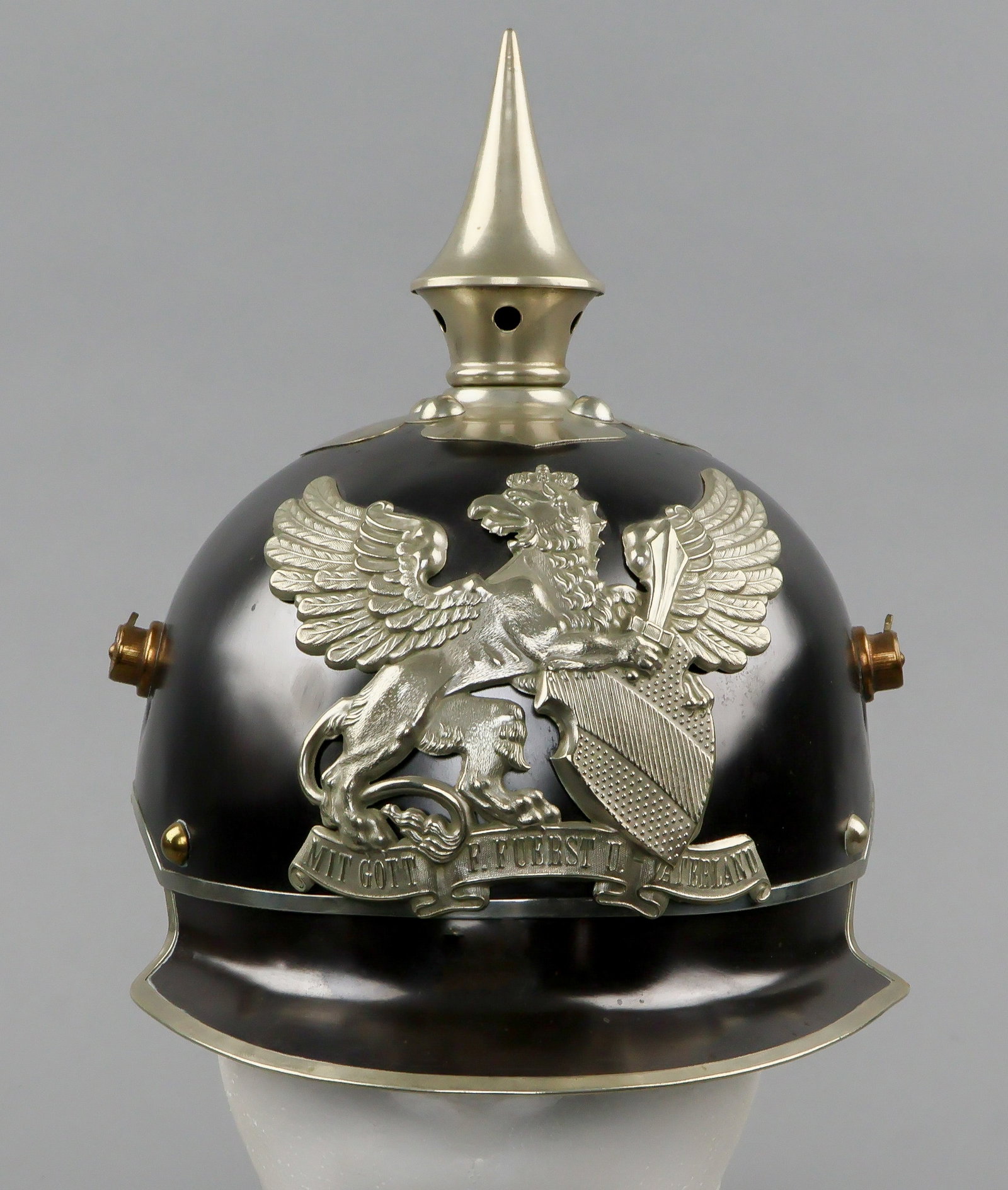 BADEN M1915 MOUNTED DISPATCH RIDER'S PICKELHAUBE HELMET: An attractive, uncommon World War I-era Imperial German ‘pickelhaube' helmet for ‘Jaeger zu Pferde', or mounted dispatch riders. The helmet is made of steel with a well-polished black fini