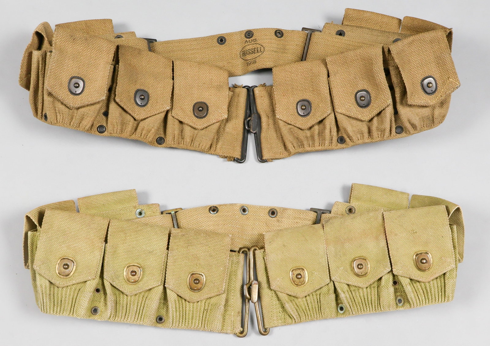 MILLS AND RUSSELL MODEL 1910 CARTRIDGE BELTS (2): A good pair of World War I-era M1910 cartridge belts for the .30-06 ammunition used by the Springfield M1903 and the M1917 rifles, includes: M1910 cartridge belt by Mills, 36 in. 4.25 in. (adjustable)