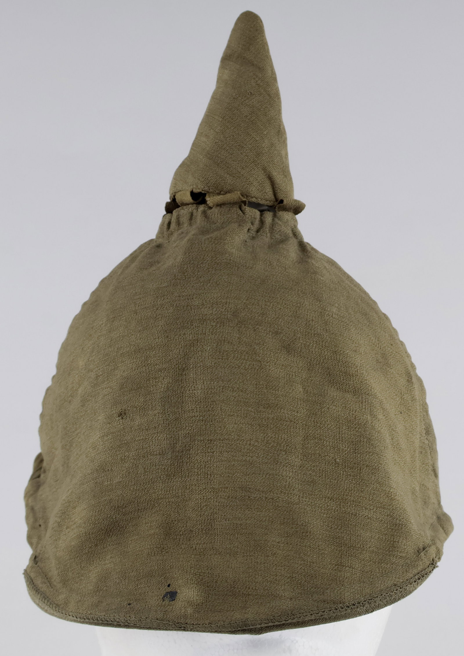 OFFICERS PICKELHAUBE COVER: A piece of Imperial German military history from World War I, this helmet cover was made for thepickelhaube, a very ornate helmet worn by officers in the German military. The mainproblem with these he