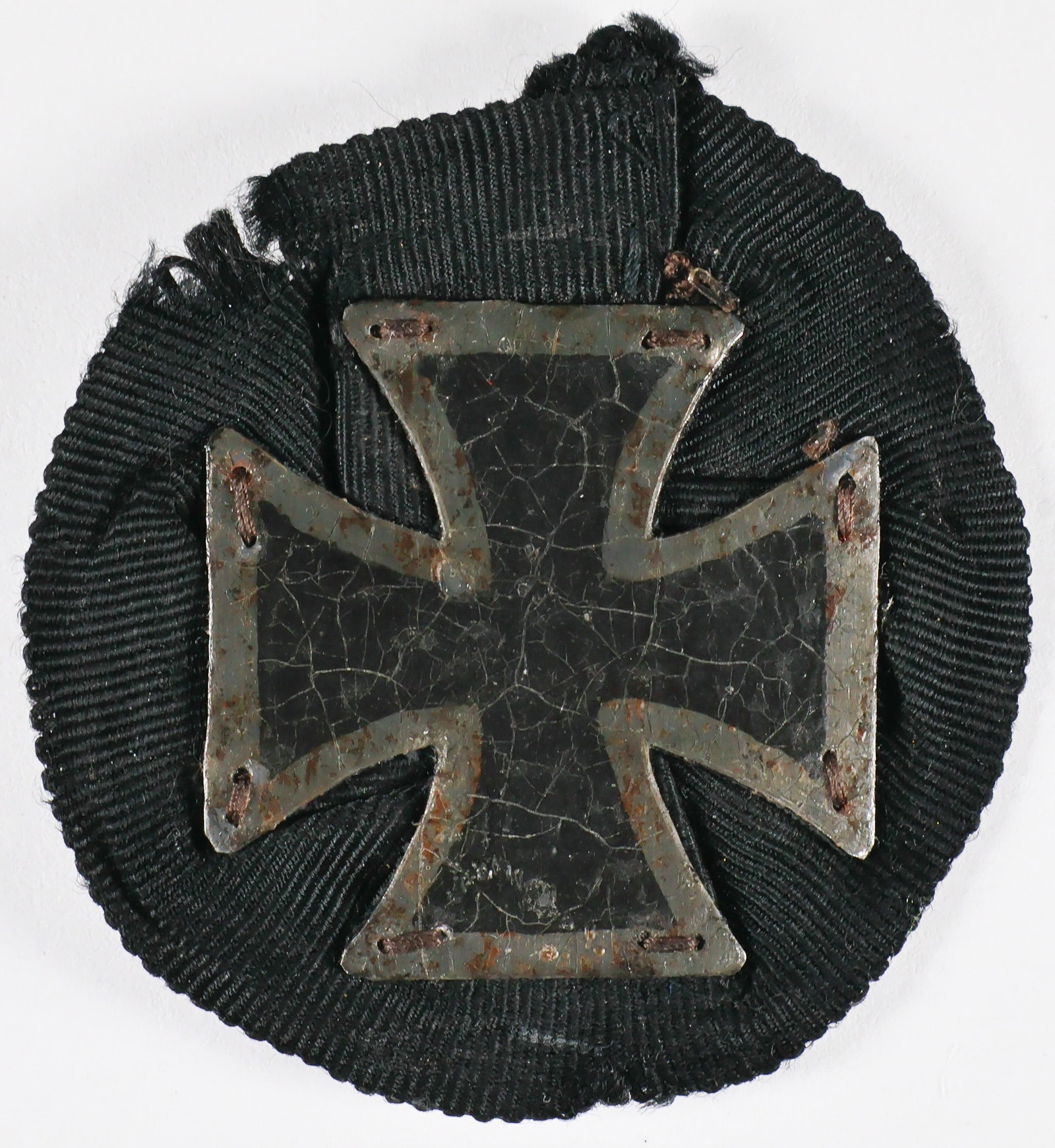 KULM IRON CROSS OF 1813: This excessively rare version of the Iron Cross was produced three years after the initial institution of the Iron Cross in 1813, a Russian-made award known as the Kulm Cross. This example, 40 mm. x