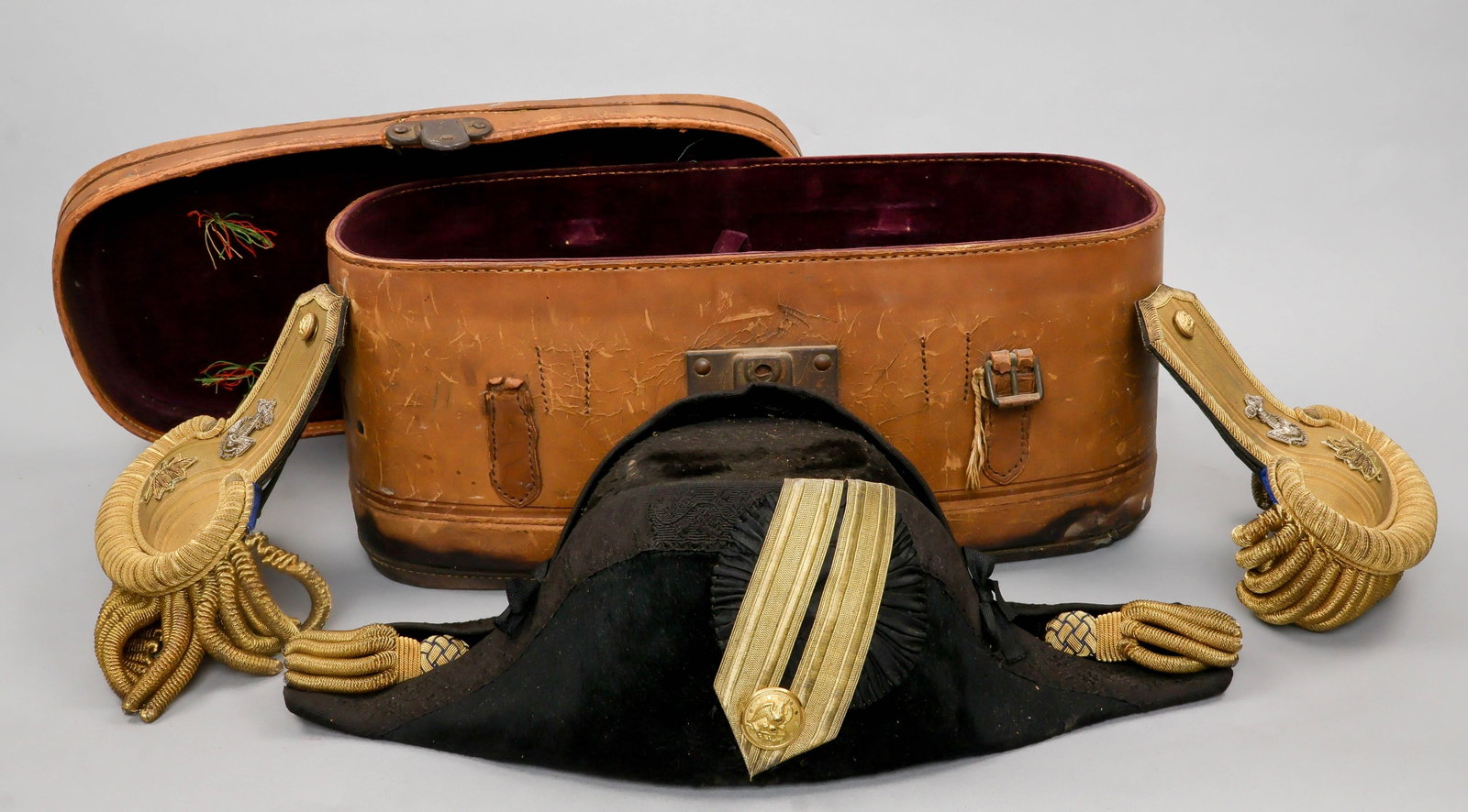 SPANISH-AMERICAN WAR NAVAL OFFICER'S BICORN CAP, BELT, AND EPAULETTES: A fine set of Spanish-American War uniform elements attributed to Commander Albert L. S. Key (Albert Lenoir Skipwith Key), a U.S. Navy officer who gained prominence during the Spanish-American War as