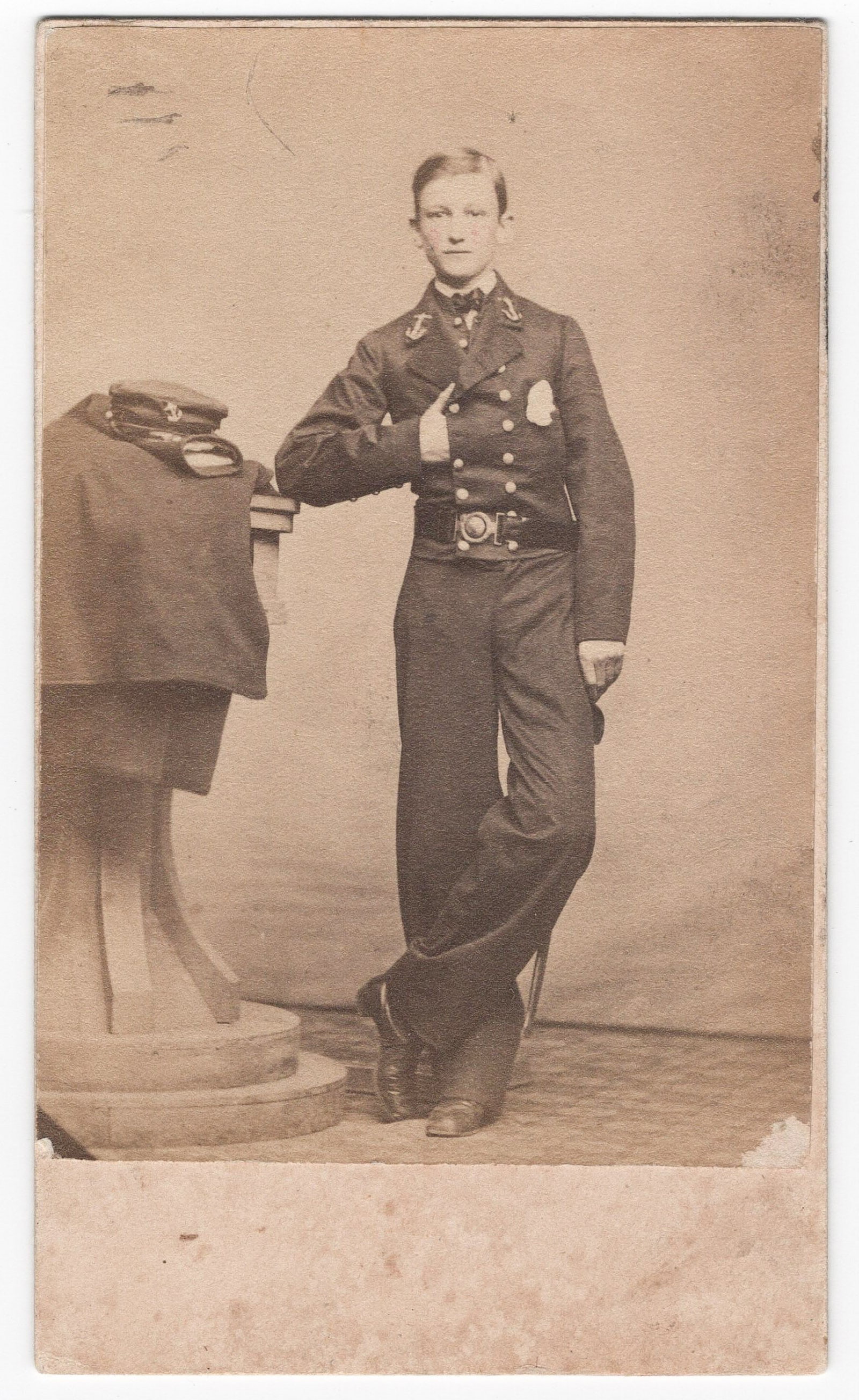(UNION NAVY) MIDSHIPMAN HENRY M. RIDGELY SIGNED CARTE DE VISITE: A fine Civil War-era carte de visite photograph, 2.5 x 4.25 in. sepia, a seldom-encountered full-length view of U.S. Navy midshipman Henry M. Ridgely in uniform, likely taken upon his ascension to