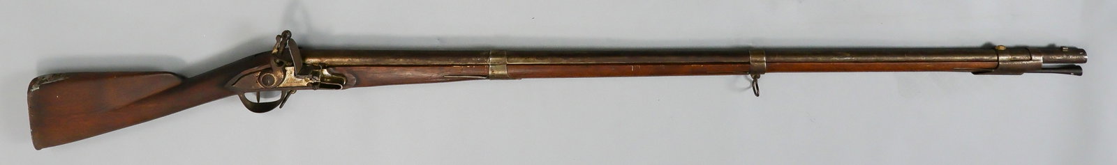 LATE MODEL COPY CHARLEVILLE MODEL 1777 MUSKET BY NAVY ARMS CO.: A modern reproduction French Model 1777 ‘Charleville’ musket, .69 caliber, 44.75 in. barrel, 59.5 in. overall, manufactured in Japan by Miroku and retailed by Navy Arms Co. The lockplate