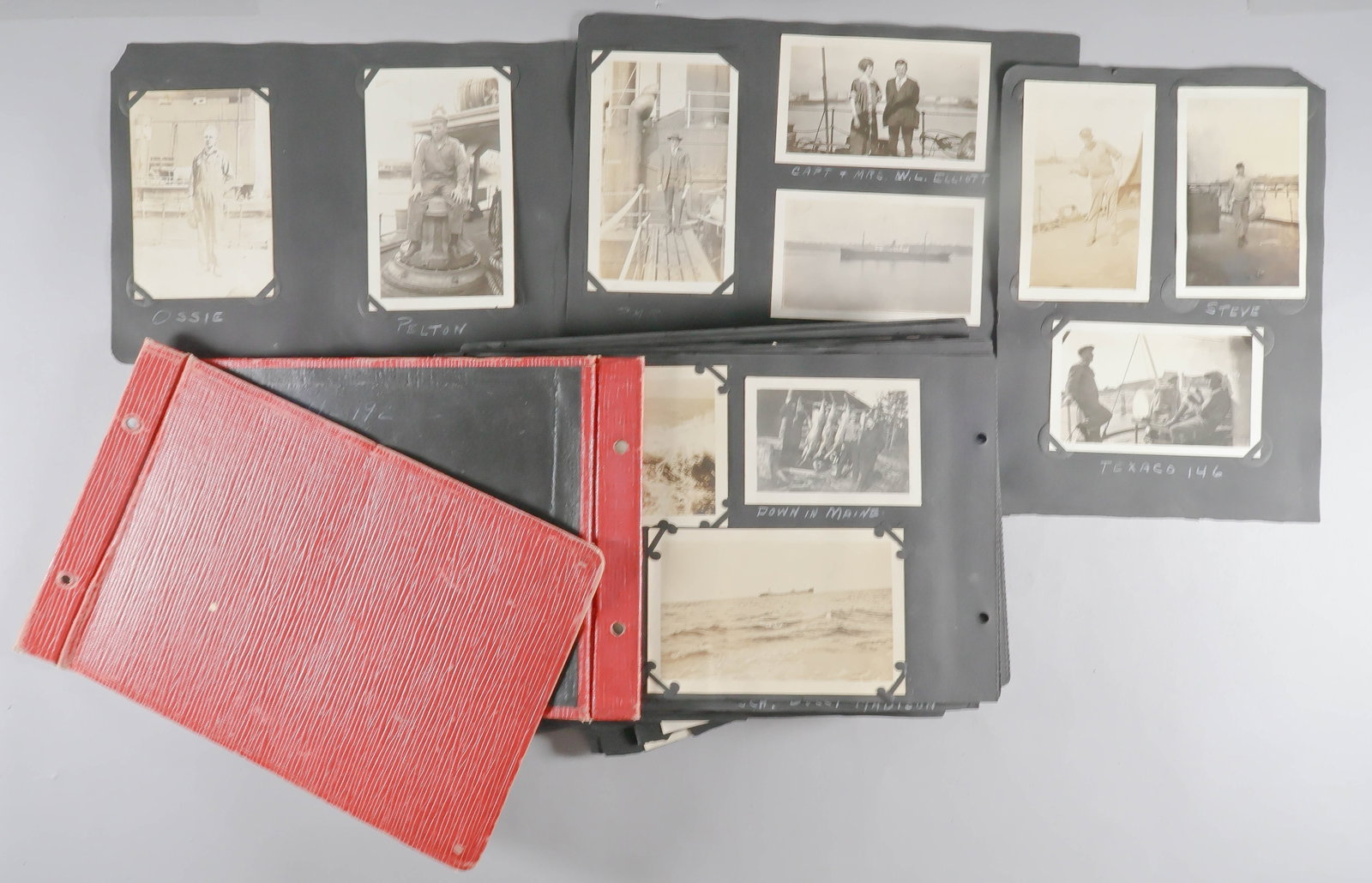 1920S STEAMSHIP SHIP PHOTOGRAPH ALBUM: An interesting album of over 250 snapshots collected by a seaman apparently serving on an American steamship ca. 1920s and which chronicle his fellow seamen, friends and family, and document his