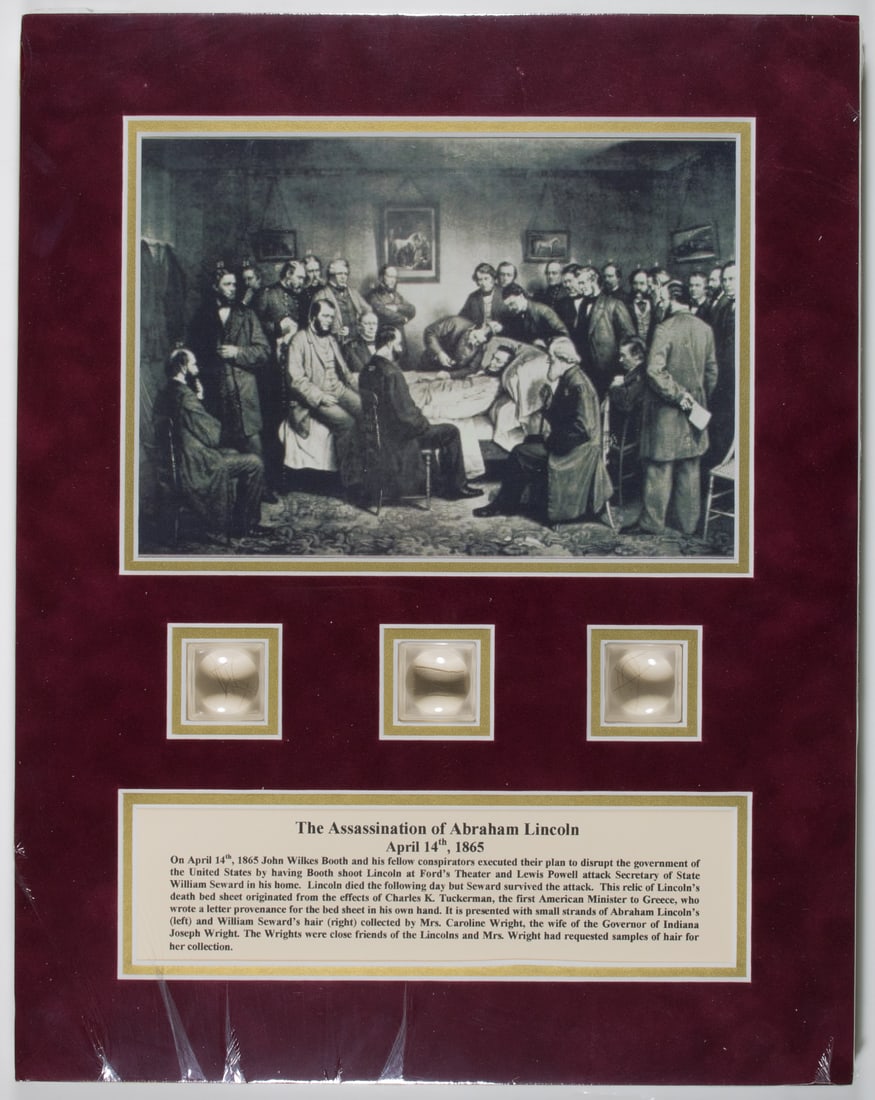 ABRAHAM LINCOLN ASSASSINATION HAIR AND DEATHBED RELIC PRESENTATION: A most impressive presentation for any Lincoln aficionado, combining six strands of hair from the head of President ABRAHAM LINCOLN (1809-1865), as well as four strands of hair from Lincoln's