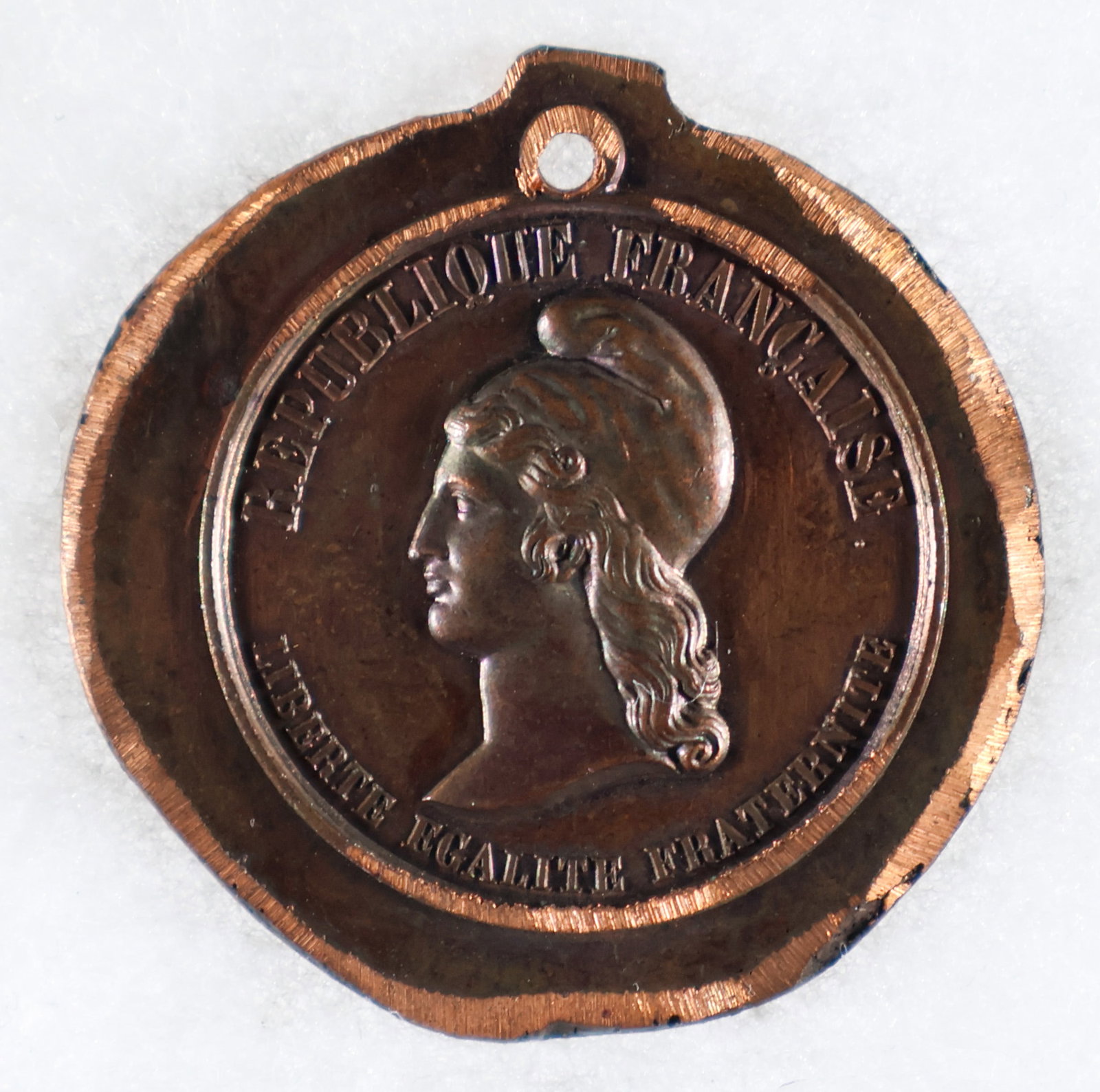 REVOLUTION OF 1848 COPPER MEDAL: French medal, 1.5 in., with the obverse showing Marianne wearing a Phrygian cap with the rim reading ‘FRENCH REPUBLIC LIBERTY EQUALITY BROTHERHOOD’. The reverse shows Hercules breaking