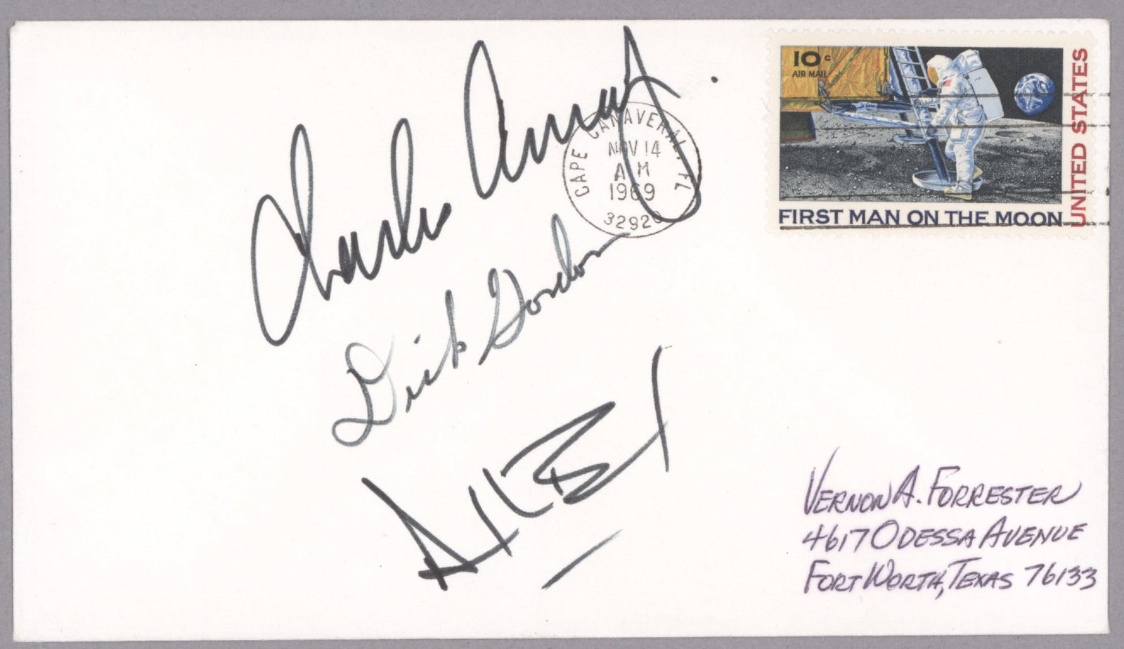 APOLLO 12 CREW SIGNED COVER: Postal cover featuring a ten cent 'First Man on the Moon' stamp cancelled at Cape Canaveral, Nov. 14, 1969 - the date of the launch of the Apollo 12 mission - signed on the face by crew members