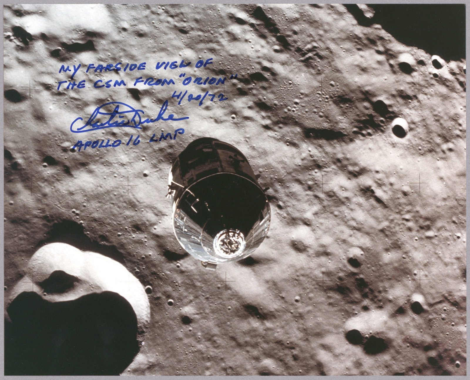 CHARLES M. DUKE: (b. 1935) American astronaut who flew on the Apollo 16 mission, one of only twelve to walk on the moon. Fine S.P., 10 x 8 in. color on Kodak paper, shows the Apollo 16 Command Module as Duke viewed