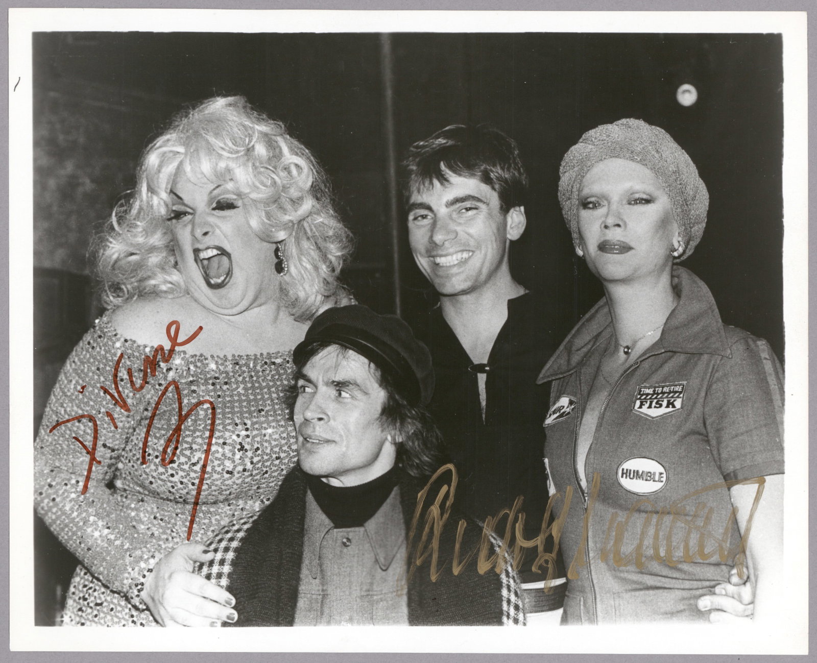 RUDOLF NUREYEV AND...DIVINE!: Very special and rare I.S.P., 10 x 8 in. b/w, a gathering of four of the most visible socialites of the Seventies and Eighties, probably taken at the iconic Studio 54. The image is signed in brown