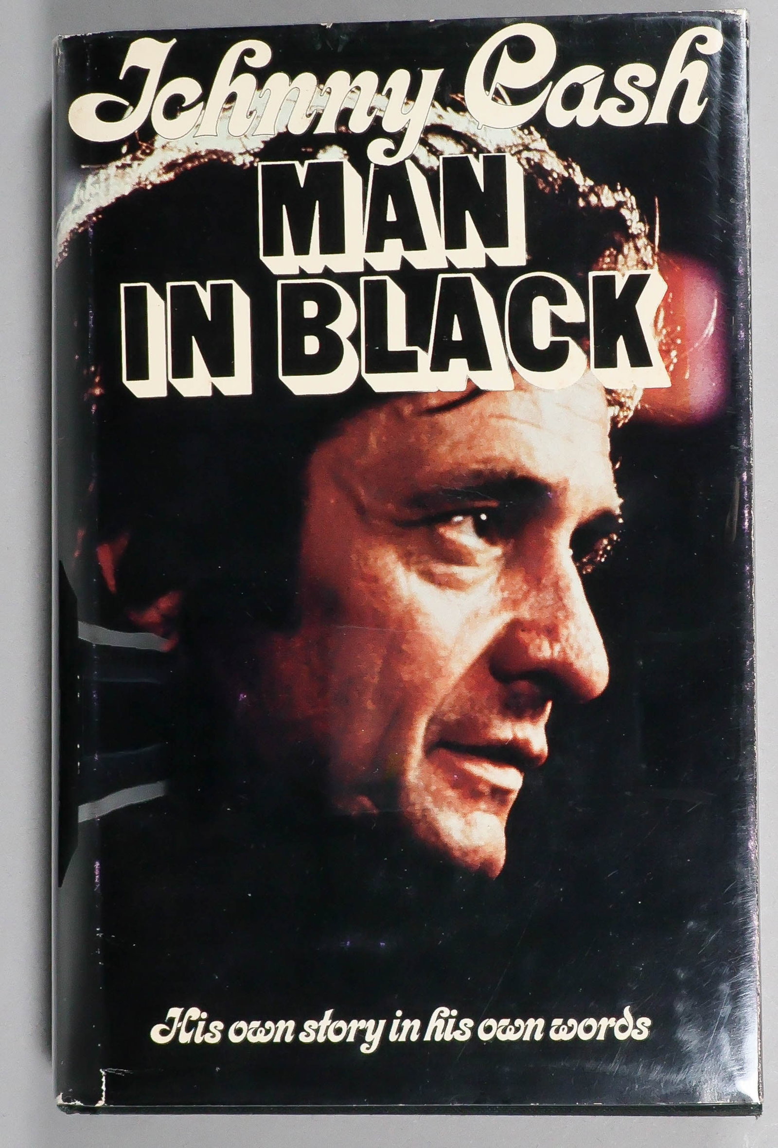 JOHNNY CASH: (1932 - 2003) American country music and rock music singer and songwriter and the husband of June Carter Cash. Scarce signed book, his autobiography 'Man in Black' (Grand Rapids: Zondervan