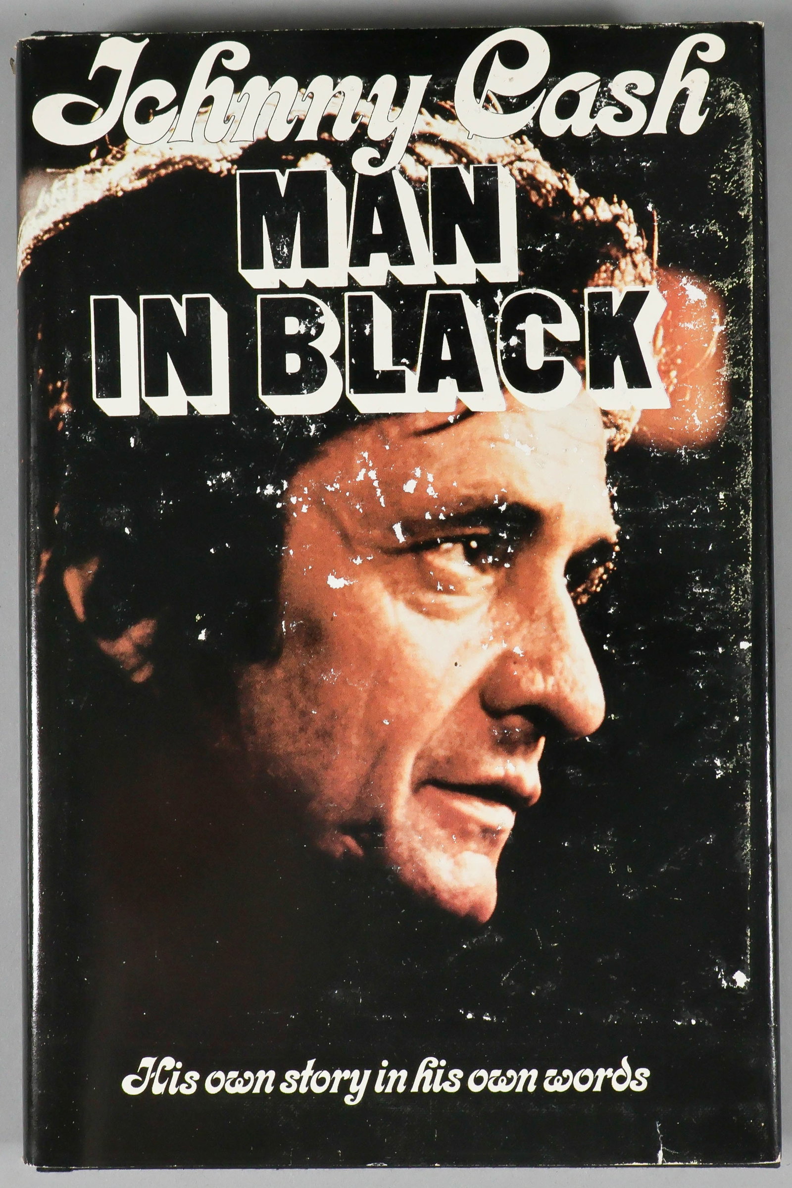 JOHNNY CASH: (1932 - 2003) American country music and rock music singer and songwriter and the husband of June Carter Cash. Scarce signed book, his autobiography 'Man in Black' (Grand Rapids: Zondervan