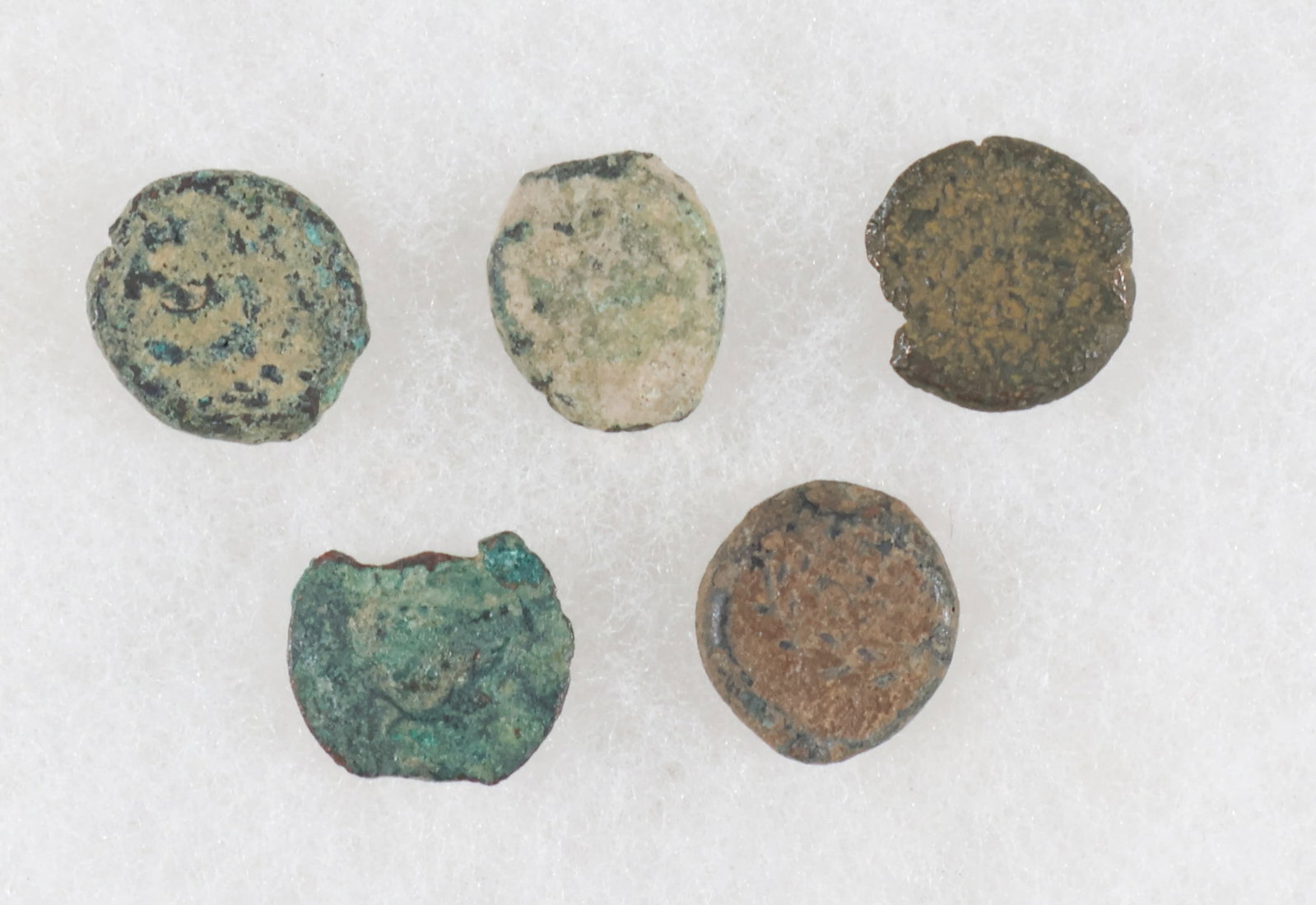 WIDOW’S MITES (5): Lot of five ‘Widow’s Mites’, barbaric, small bronze coins minted in or near Jerusalem around 75 B.C. to make up for the shortage of the Prutah of Alexander coin. This was the lowest