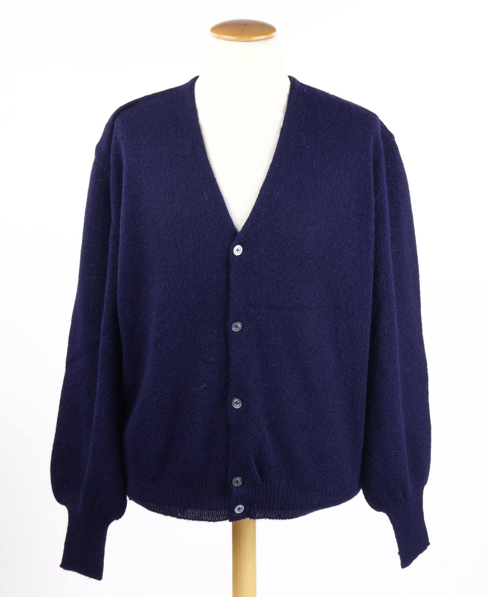 MICKEY COHEN'S NAVY BLUE ALPACA SWEATER: MICKEY COHEN (1913 - 1976) American gangster who started his career as Bugsy Siegel's bodyguard, but said to have been absent at Siegel's death on orders from Meyer Lansky. Cohen later fought for
