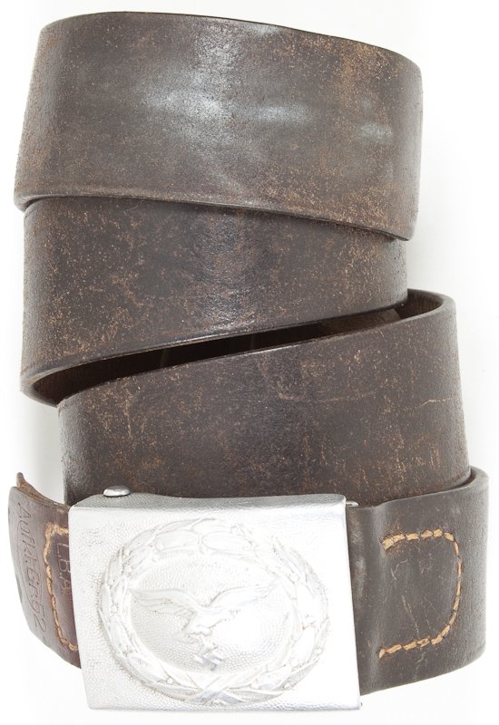 LUFTWAFFE BUCKLE AND BELT: LUFTWAFFE BUCKLE AND BELT Luftwaffe belt buckle and leather belt, issued to air force personnel as well as paratroopers. Aluminum, with rectangular receiving catch on reverse, maker-stamped leather ta