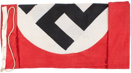 LARGE N.S.D.A.P. FLAG: LARGE N.S.D.A.P. FLAG Enormous N.S.D.A.P. 4' 11" x 8' 2" flag, printed through design, the disk being off-centered, which would be used at sea, with far corners lightly overstitched, canvas reinforcem