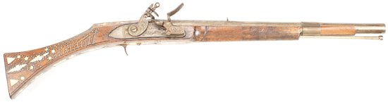 NORTH AFRICAN SHORT FLINTLOCK MUSKET: NORTH AFRICAN SHORT FLINTLOCK MUSKET North African short flintlock musket, ca. late 1800s, 31 1/2" long overall, with a 19 1/2" long barrel. This firearm is beautiful in its simplicity: the rear and t
