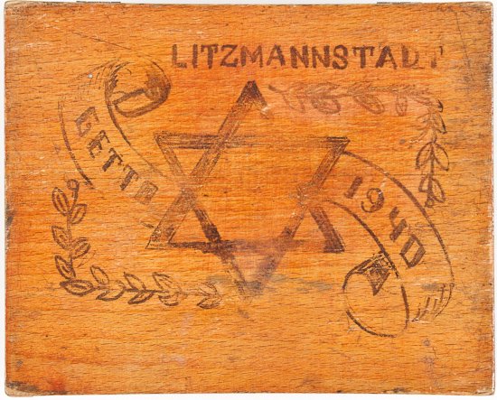 LITZMANNSTADT GHETTO STAR OF DAVID WOOD BOX: LITZMANNSTADT GHETTO STAR OF DAVID WOOD BOX Litzmannstadt ghetto hand-decorated box once belonging to a Polish Jewish family residing there, 5 1/2" x 4 1/2" x 2" finished pine with hand-inked design o