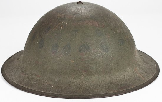 AMERICAN INTER-WAR HELMET: AMERICAN INTER-WAR HELMET American military helmet, strap and liner typical of that used shortly before World War II and on Wake Island during its defense, green "sand" type finish, brown leather line