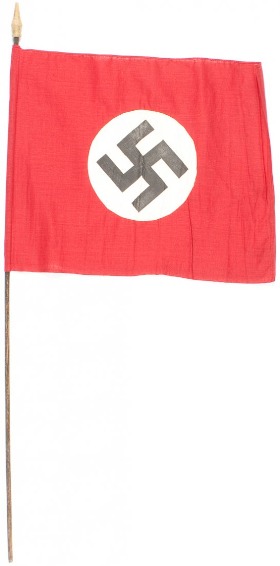 N.S.D.A.P. FLAG: N.S.D.A.P. FLAG Small N.S.D.A.P. cotton flag, 19" x 15", double-sided with a separate white circular field with printed mobile swastika sewn on. The left side of the flag has been looped about a 38" w