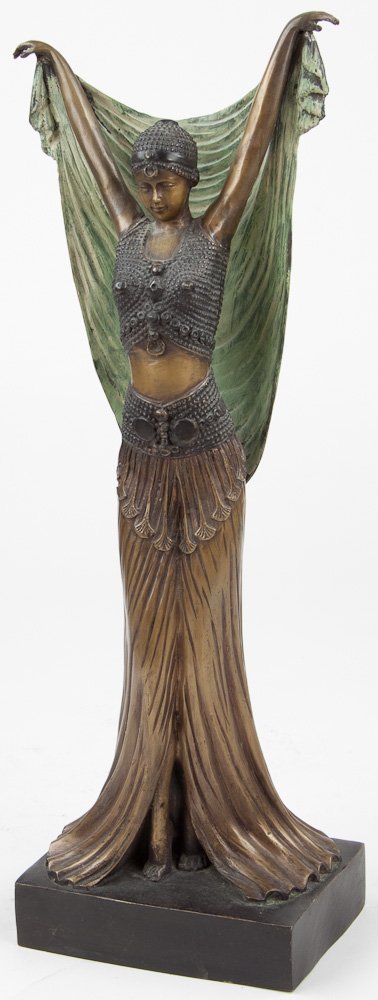 ART DECO CAST BRONZE: ART DECO CAST BRONZE (Kieff Grediaga). Art Deco cast bronze of a lady with cape, her arms stretched above her head, set upon a wood base. Unsigned, attributed to Grediaga. 24 1/2" tall, incl. base.