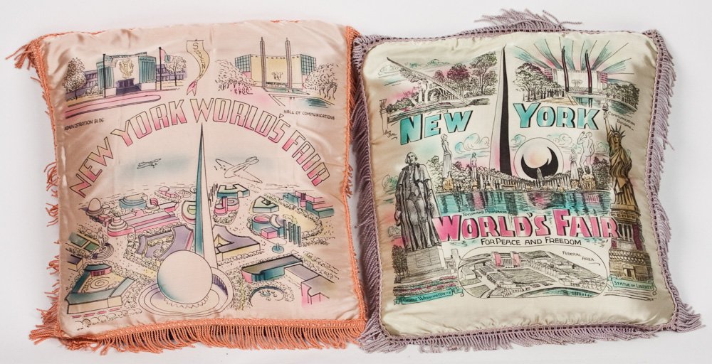 1939 WORLD'S FAIR PILLOWS (2): 1939 WORLD'S FAIR PILLOWS (2) 1939 World's Fair throw pillows, rayon prints with fringe trim, 19" x 19". Two pieces.