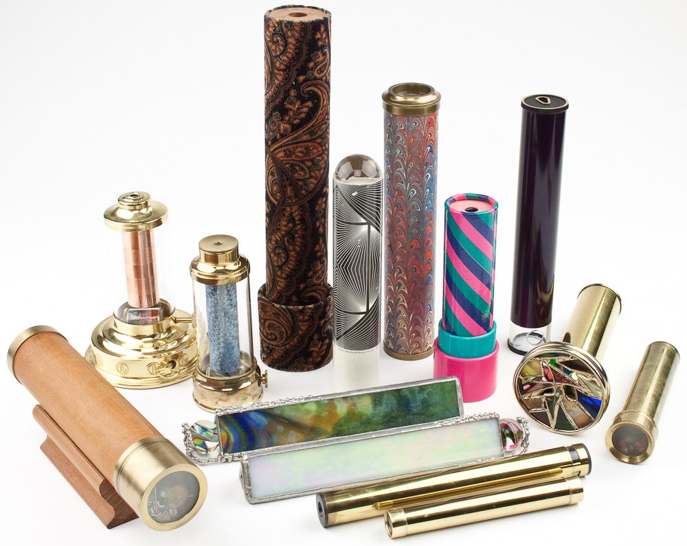 KALEIDOSCOPES: KALEIDOSCOPES Group of kaleidoscopes, 11 pcs., various dates, styles, and functions from antique to modern, simple to fancy.