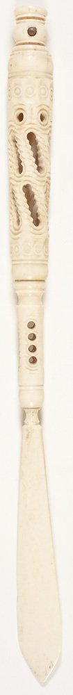 CHINESE CARVED IVORY OR BONE LETTER OPENER: CHINESE CARVED IVORY OR BONE LETTER OPENER Chinese carved ivory or bone letter opener, 8 1/4" long, an ornate design and completely intact. Interestingly, if one peers through the tiny hole at top, a 