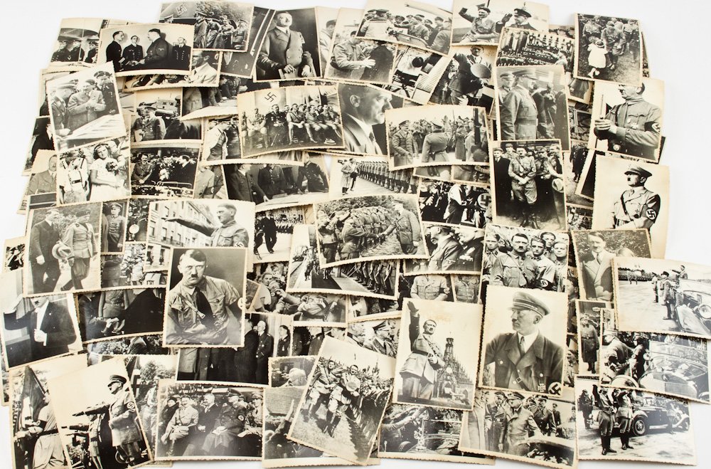 ADOLF HITLER: ADOLF HITLER Lot of about 95 4 1/2" x 3" photos, all different and likely second generation, Ukrainian archive images Adolf Hitler in a huge variety of setting including greeting dignitaries, reviewin