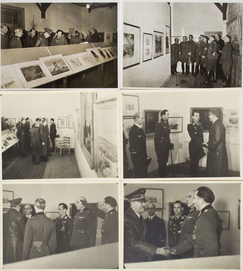 ADOLF HITLER PHOTOGRAPHS: ADOLF HITLER PHOTOGRAPHS Good lot of seven 7" x 4" photographs, two bearing backstamps of Heinrich Hoffmann, all portraying Adolf Hitler and military officers attending an exhibition of military art.