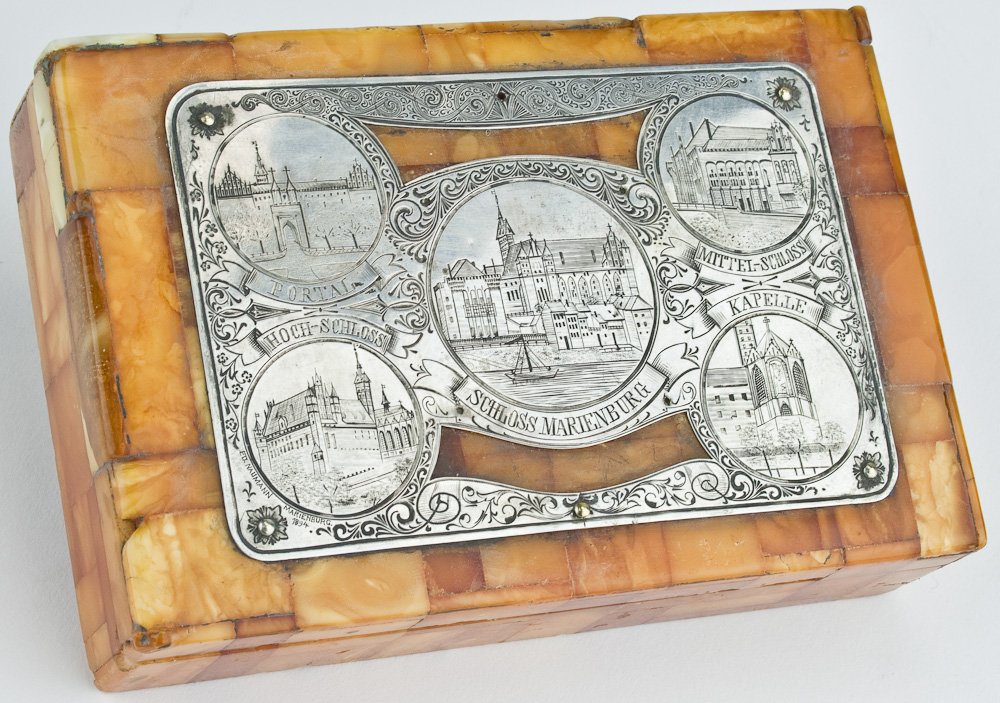 "BERNSTEIN" AMBER BOX WITH MARIENBURG ENGRAVED SILVER: "BERNSTEIN" AMBER BOX WITH MARIENBURG ENGRAVED SILVER SCENE A fine example of the work of the maker of the East Prussian "amber" editions of "Mein Kampf", an amber covered box celebrating the German c