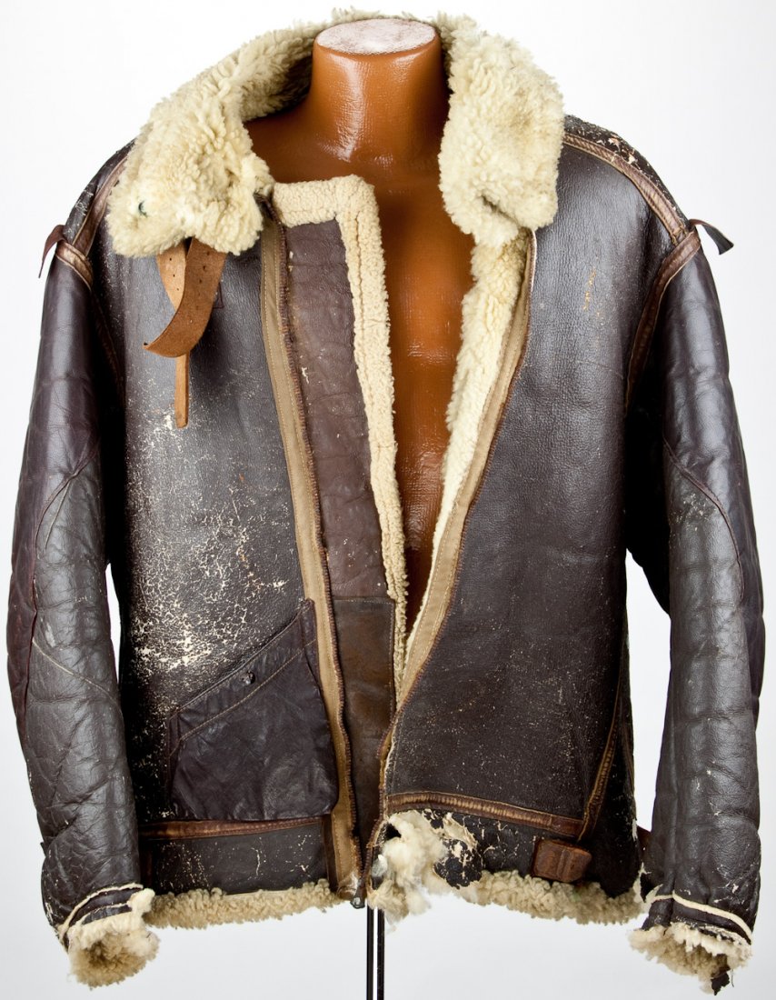 "STEPPIN' OUT" PAINTED BOMBER JACKET: "STEPPIN' OUT" PAINTED BOMBER JACKET Painted World War II sheepskin "bomber" jacket, a heavy model B-3, size 46, made by H.L.B. Corp. The verso of the heavily-worn jacket bears the name of the bomber: