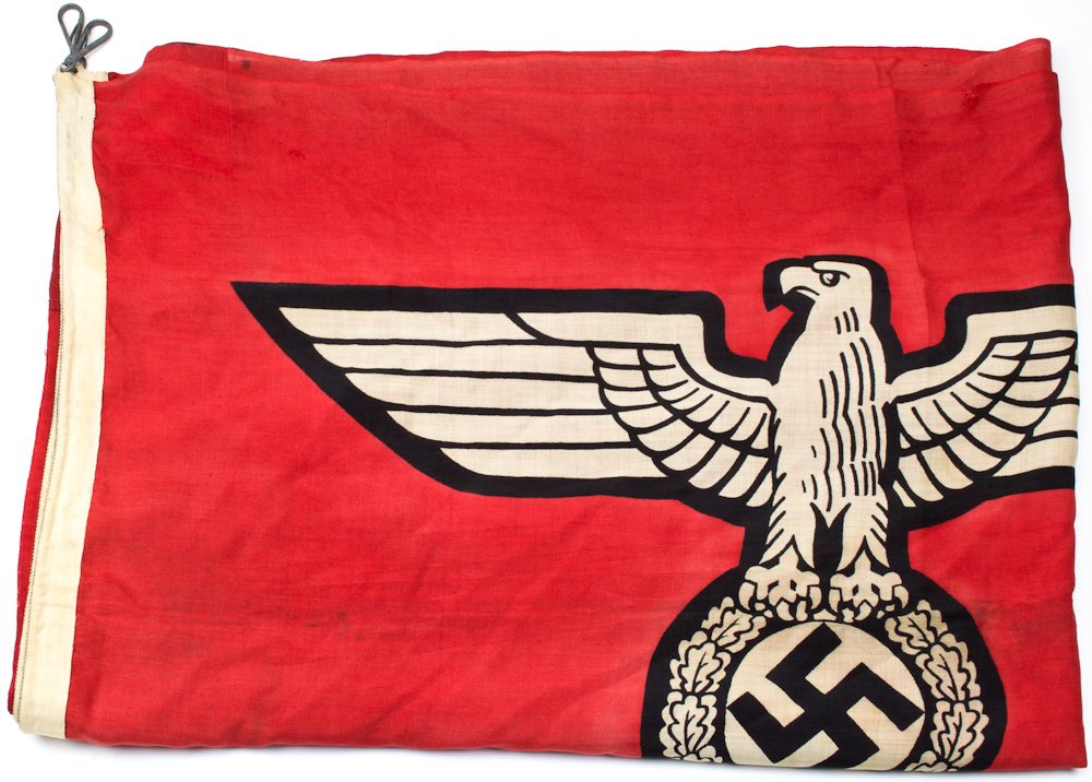 OVERSIZED REICHSKRIEGSFLAGGE: OVERSIZED REICHSKRIEGSFLAGGE Large Reichskriegsflagge, 7' 8" along the canvas hoist, 12' 10" wide, made of two horizontal sections of cotton sewn together at center, the far corners bearing stronger (