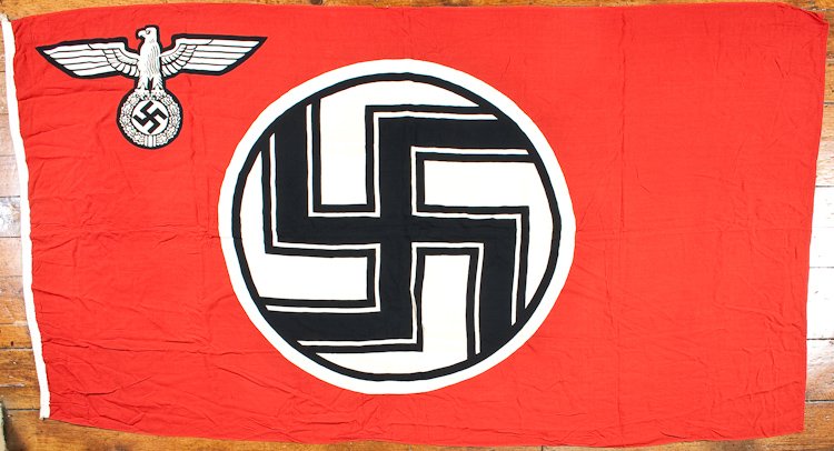 REICHSKRIEGS FLAG: REICHSKRIEGS FLAG German battle flag, 92" x 50", fine cotton printed on both sides with cord (loops cut) woven into fly, patch sewn to fly with maker's name: "Bonner Fahnenfabrik". A few trivial stain