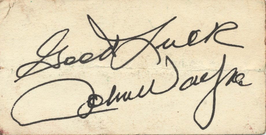 (JOHN WAYNE): (JOHN WAYNE) John Wayne's calling card bearing his printed signature on verso: "Good luck John Wayne". Some light wear.