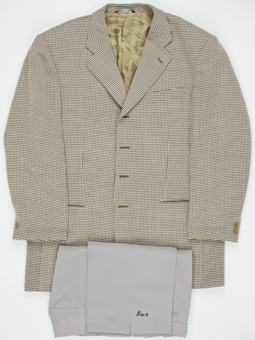 PETE ROSE'S 1970 HOUNDSTOOTH JACKET AND TROUSERS: PETE ROSE'S 1970 HOUNDSTOOTH JACKET AND TROUSERS A relic of the golden years of Cincinnati slugger Pete Rose, a houndstooth jacket and gray trouser worn by Rose ca. 1970. The Italian wool jacket, a 46