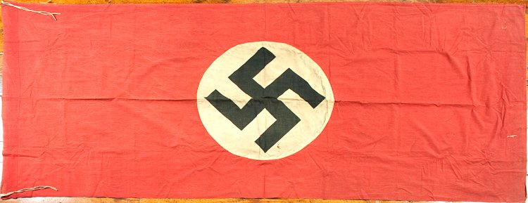 LARGE N.S.D.A.P. HANGING BANNER: LARGE N.S.D.A.P. HANGING BANNER Large N.S.D.A.P. hanging two-sided banner 46"" x 108"" cotton construction a separate white field with printed black mobile swastika sewn to the red body. The top of th