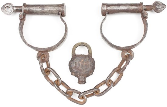 MID-1800S LOCKING SHACKLES: MID-1800S LOCKING SHACKLES Pair of mid-1800s locking shackles, 18" long overall, hand-forged steel with individual locks operated by turning the keys (provided) until the hasp is freed. Though it is n