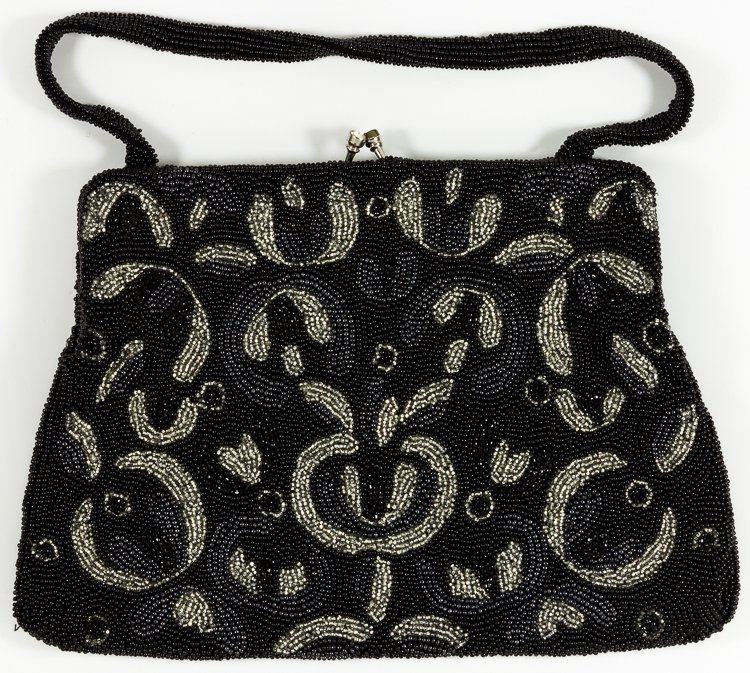 EVA BRAUN'S BEADED EVENING PURSE, CHANGE PURSE AND: EVA BRAUN'S BEADED EVENING PURSE, CHANGE PURSE AND HANDKERCHIEF A fine relic reflecting the opulent lifestyle enjoyed by the mistress and one-day wife of Adolf Hitler, a well-crafted beaded purse bear