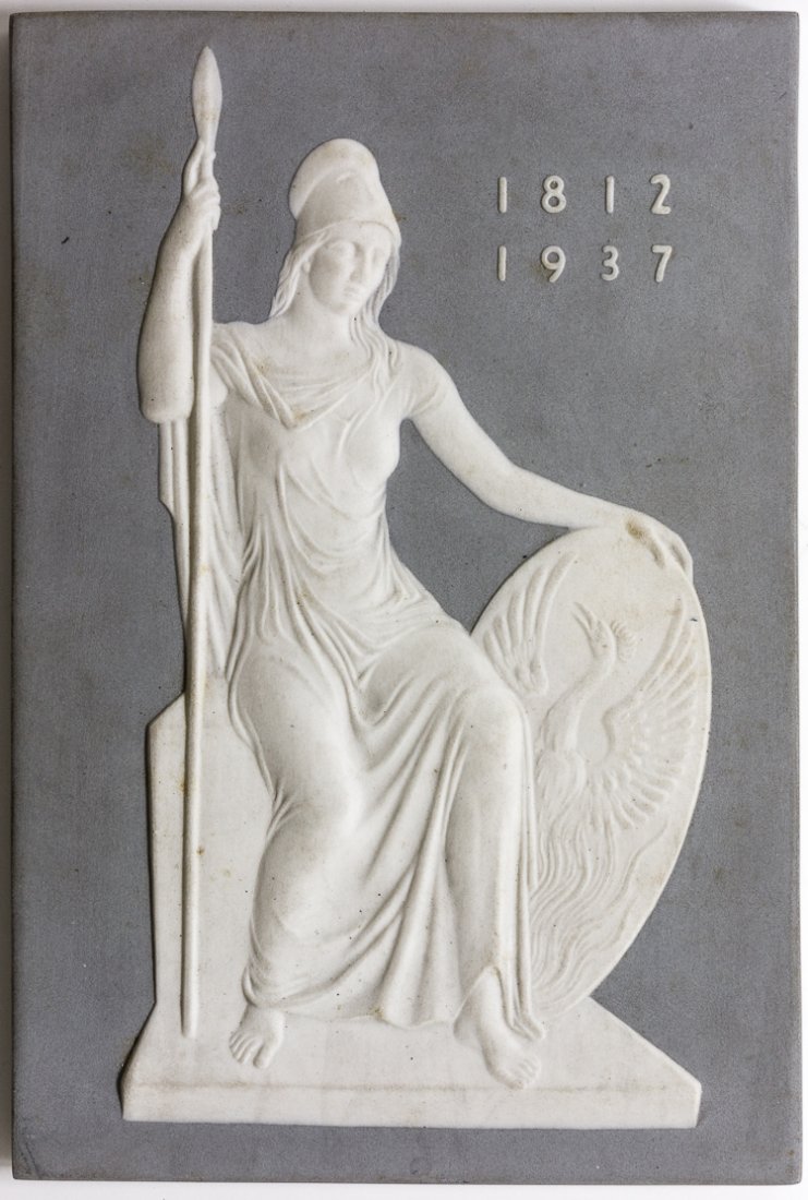 BERLIN KPM PORCELAIN PRESENTATION: BERLIN KPM PORCELAIN PRESENTATION KPM porcelain plaque, 4 1/4" x 6 1/4" x 1/4", slate gray body with goddess Athena with shield in white relief on the obverse. The reverse reads in German: "Dedicated