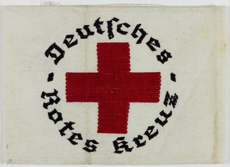 GERMAN RED CROSS ARMBAND: GERMAN RED CROSS ARMBAND Deutsches Rotes Kreuz armband, white cotton 17 1/2" x 4 3/4", embroidered in red and black. Some minor stains, else very good.