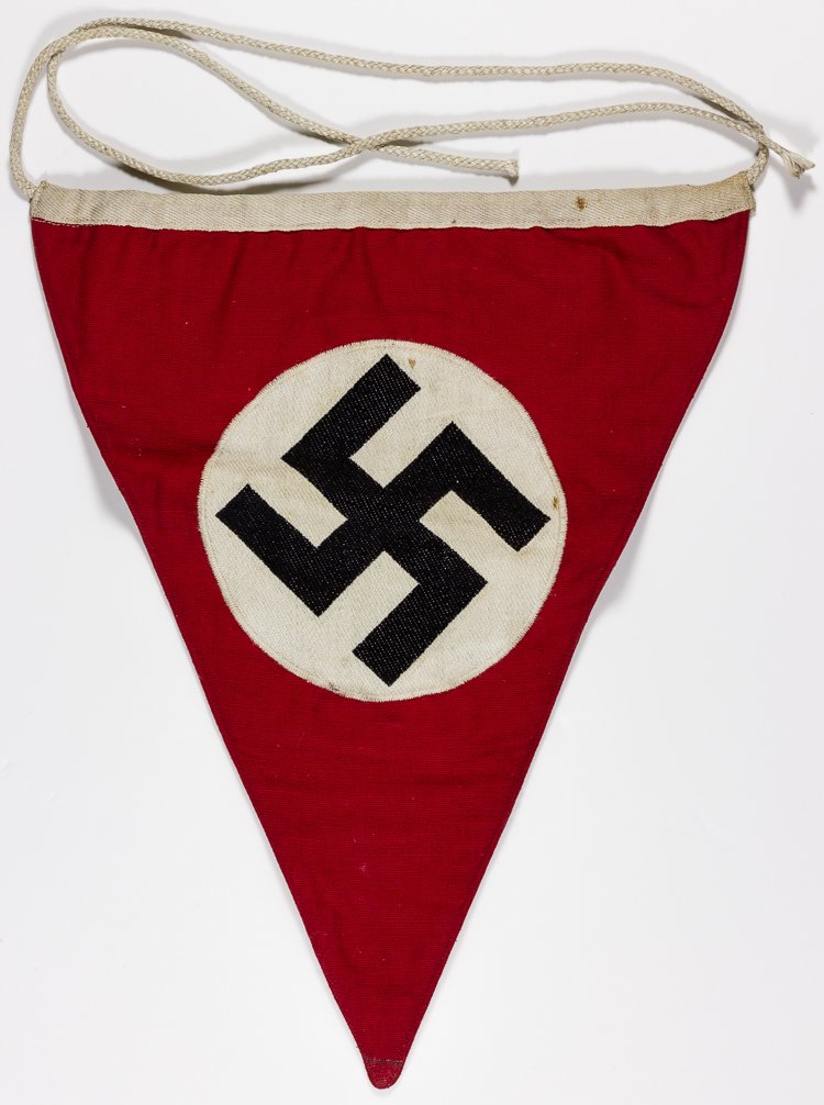 N.S.D.A.P. PENNANT: N.S.D.A.P. PENNANT High quality triangular two-sided N.S.D.A.P. pennant, 11" wide, 9" along the hoist, with a BeVo type swastika sewn to a ribbed white field which in turn has been fixed to the heavy 