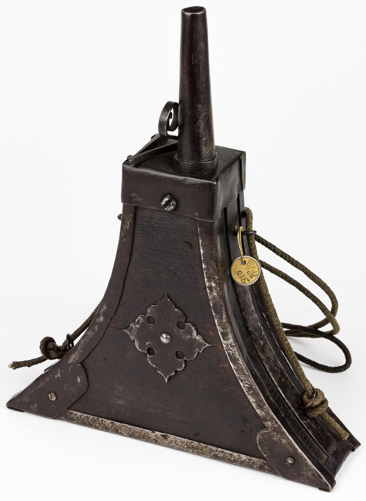 17TH CENTURY MATCH LOCK POWDER FLASK: 17TH CENTURY MATCH LOCK POWDER FLASK An early 17th century powder flask of classic English or Continental design, a triangular wood body with iron bands at all edges including iron loops for a shoulde