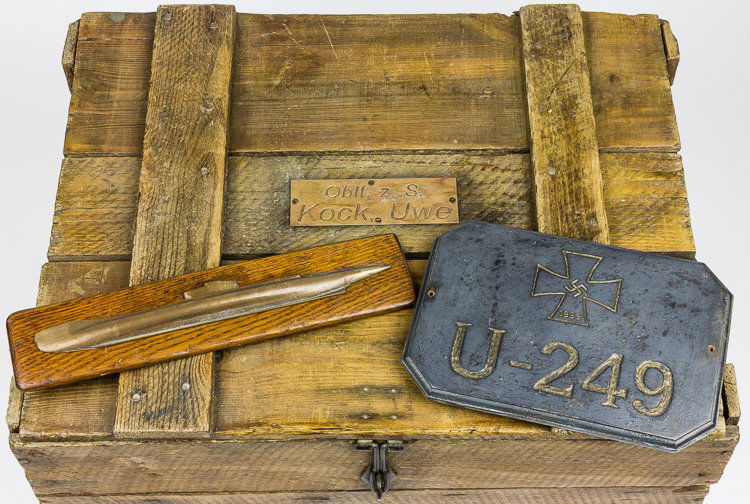 U-249 CAPTAIN'S SEA CHEST, SHIP MODEL AND WALL PLAQUE -: U-249 CAPTAIN'S SEA CHEST, SHIP MODEL AND WALL PLAQUE - THE FIRST U-BOAT TO SURRENDER AT THE END OF WORLD WAR A group of three items taken from the commander of the surrendered German U-boat U-249 by