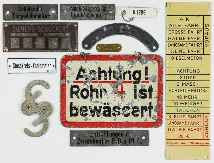 U-BOAT SIGNS: U-BOAT SIGNS Lot of 11 metal signs recovered from various German U-boats. Includes: an enameled engine control panel from a conning tower, marked in German with all the necessary engine speeds and set