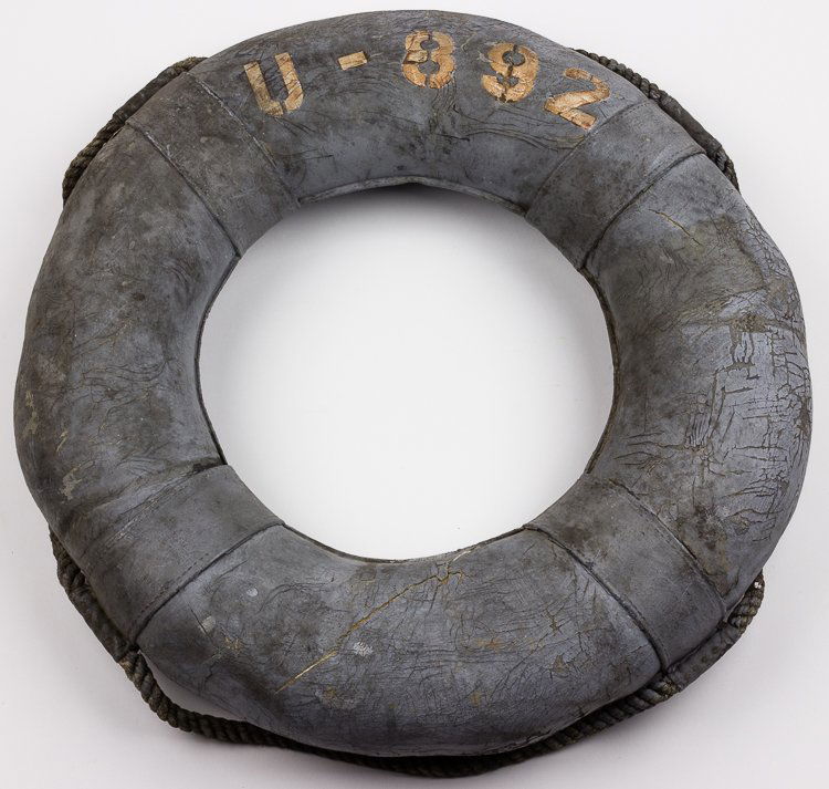 U-892 LIFE RING: U-892 LIFE RING Life ring removed from German U-892, a Type IX C submarine built by A.G. Wesser, Bremen launched in 1944 but never commissioned. The 23" diameter ring bears a gray painted canvas cover
