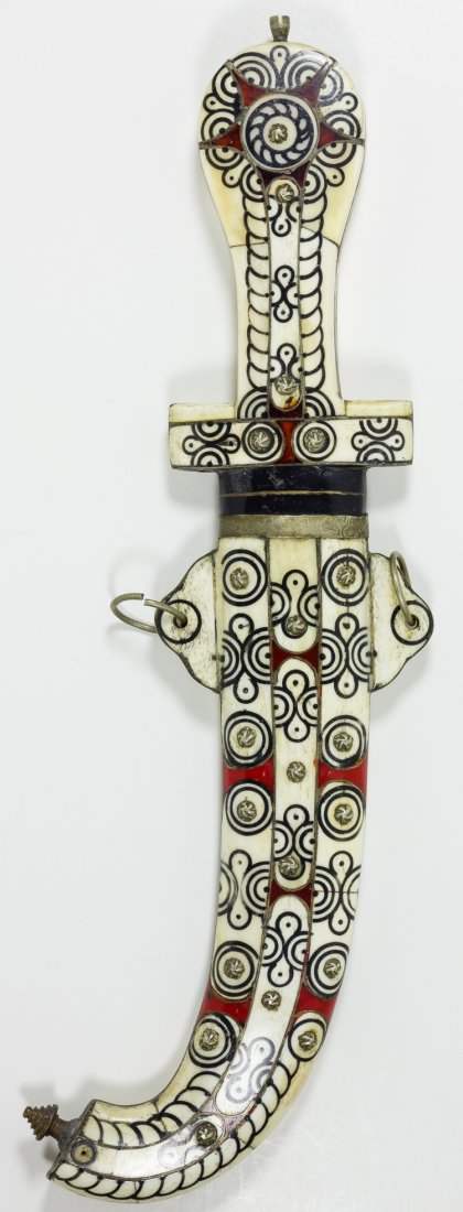 NORTH AFRICAN DECORATED DAGGER AND SCABBARD: NORTH AFRICAN DECORATED DAGGER AND SCABBARD Large khanjar-style dagger, 15" long, with an 8 1/4" long blade. The blade is curved two-thirds of the way along its length, and is sharpened on both sides.